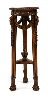 Lot 354 - A French mahogany jardiniere stand