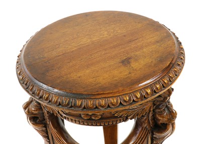 Lot 354 - A French mahogany jardiniere stand
