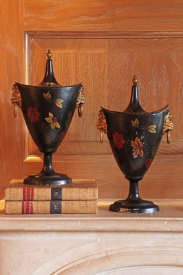 Lot 97 - A pair of painted spelter chestnut vases and covers