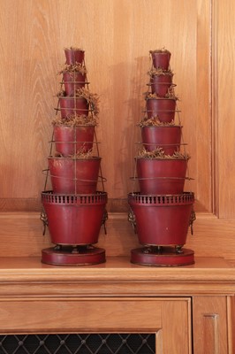 Lot 152 - A pair of red-painted toleware graduated vases