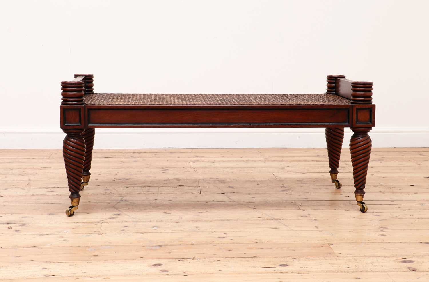 Lot 283 - A bergère coffee table or window seat