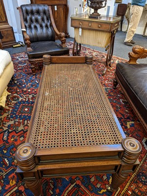 Lot 283 - A bergère coffee table or window seat