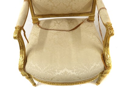 Lot 353 - A pair of Louis XVI style giltwood armchairs