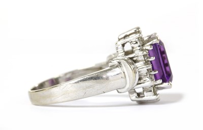 Lot 1247 - An American white gold, amethyst and diamond rectangular cluster ring