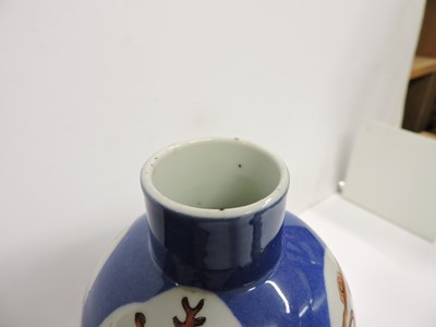 Lot 132 - A set of three Chinese blue and white vases and covers