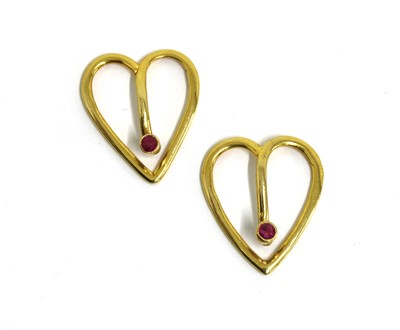 Lot 1059 - A pair of gold ruby set bow tie clips