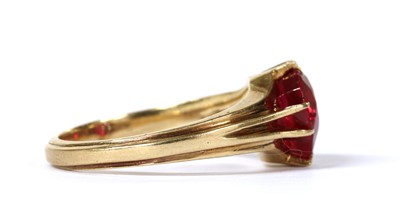 Lot 215 - A gold single stone synthetic ruby ring