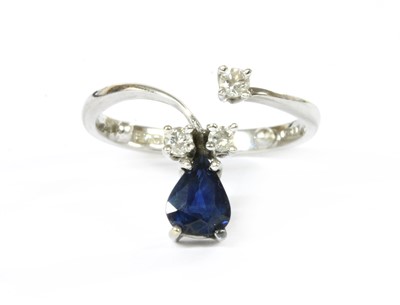 Lot 1218 - An 18ct white gold sapphire and diamond ring