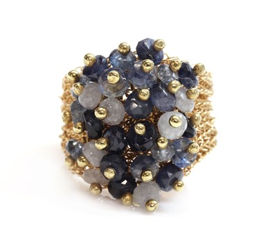 Lot 335 - An 18ct gold sapphire cluster ring, by Rina Tairo