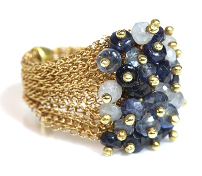Lot 335 - An 18ct gold sapphire cluster ring, by Rina Tairo