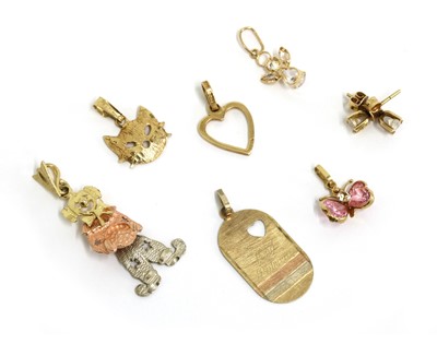 Lot 360 - A quantity of gold charms