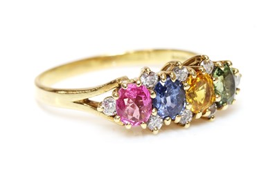 Lot 428 - An 18ct gold sapphire and diamond ring