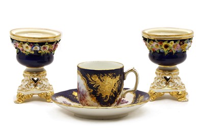 Lot 214 - A Sèvres style cup and saucer