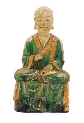 Lot 359 - A Chinese sancai-glazed monk