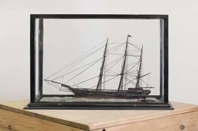 Lot 11 - A cased model ship