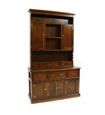Lot 305 - A George III style oak dresser