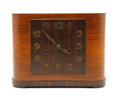 Lot 118 - An Art Deco walnut and rosewood mantel clock