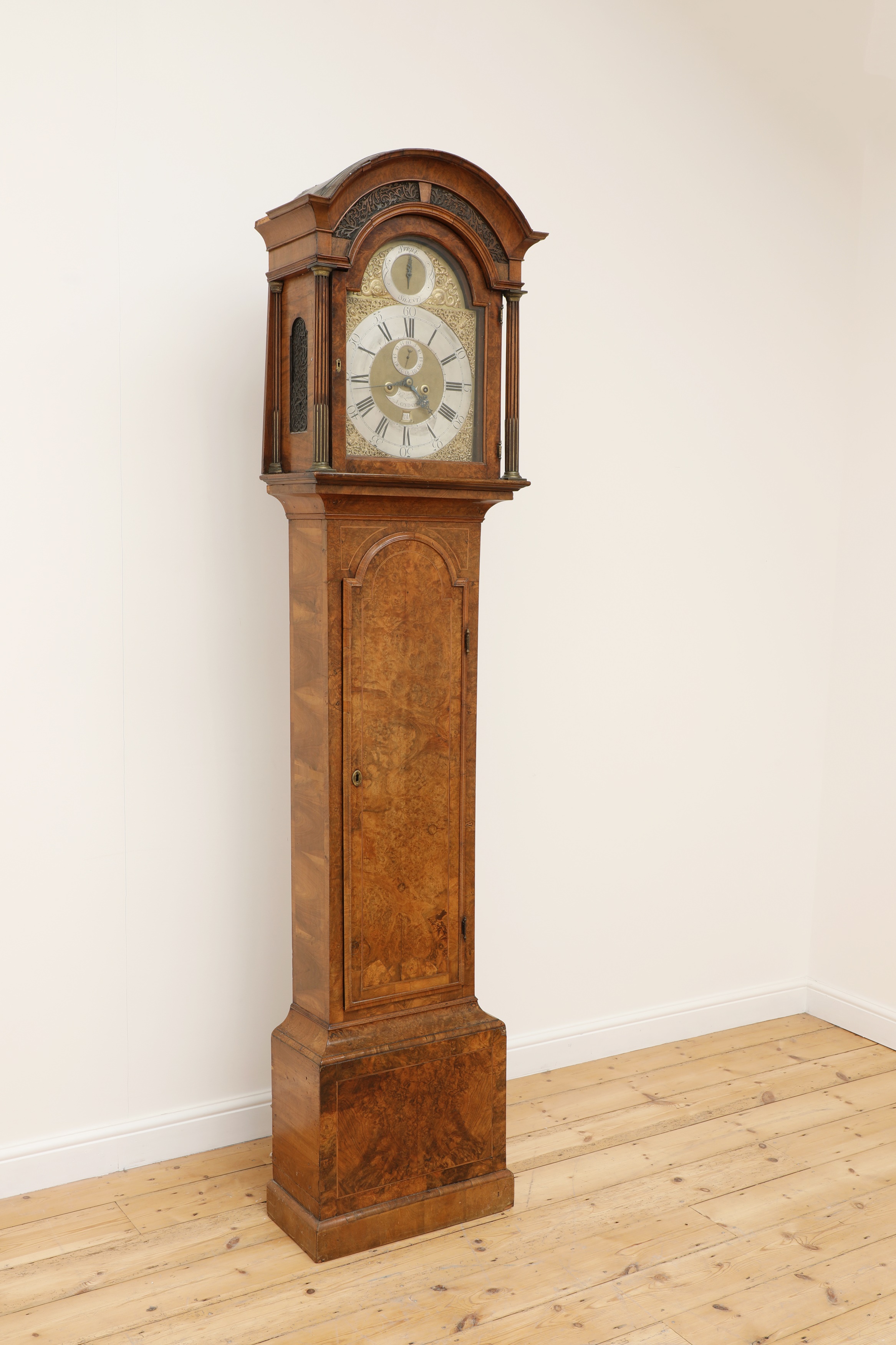 Lot 331 - A figured walnut longcase clock by Nicholas