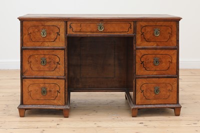 Lot 708 - A Northern European parquetry-inlaid specimen wood twin pedestal desk