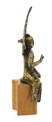 Lot 124 - A Chinese gilt-bronze Buddha