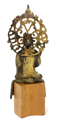 Lot 124 - A Chinese gilt-bronze Buddha