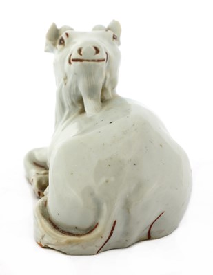 Lot 324 - A Chinese white-glazed goat