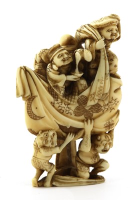 Lot 425 - A Japanese ivory okimono