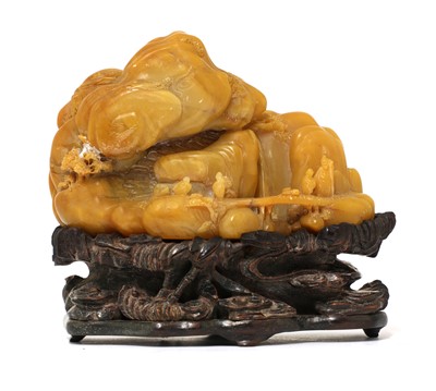 Lot 84 - A Chinese soapstone boulder carving