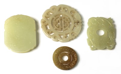 Lot 319 - A collection of four Chinese jade pendants