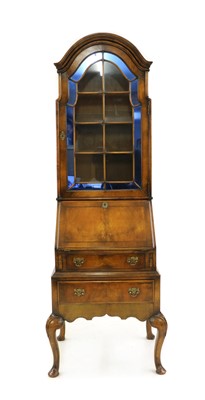 Lot 342 - A Queen Anne style walnut bureau bookcase