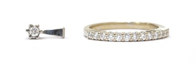 Lot 154 - A white gold diamond half eternity ring