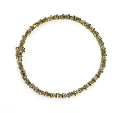 Lot 271 - A 9ct gold emerald and diamond bracelet