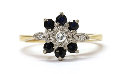 Lot 286 - An 18ct gold sapphire and diamond cluster ring