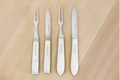 Lot 688 - Two pairs of silver and mother-of-pearl folding fruit knives and forks