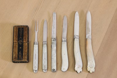 Lot 692 - Four silver and mother-of-pearl folding fruit knives and a pair