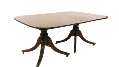 Lot 355 - A mahogany pedestal dining table