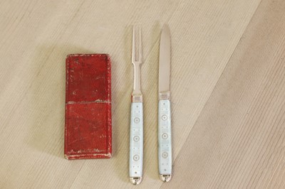 Lot 693 - A gold and mother-of-pearl folding fruit knife and fork