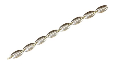 Lot 415 - A sterling silver and gold bracelet, by Georg Jensen