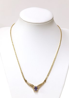 Lot 450 - An Italian tanzanite and diamond cluster wishbone necklace