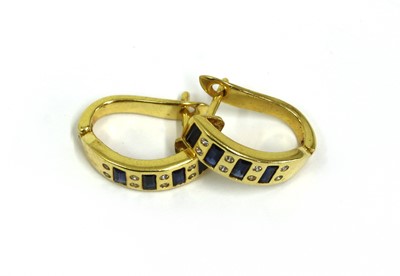 Lot 296 - A pair of gold sapphire and cubic zirconia hoop earrings