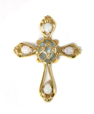 Lot 1243 - A 14ct gold blue topaz and opal cross pendant