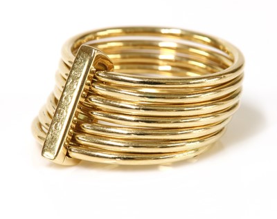 Lot 498 - An 18ct gold seven row ring, by Gucci