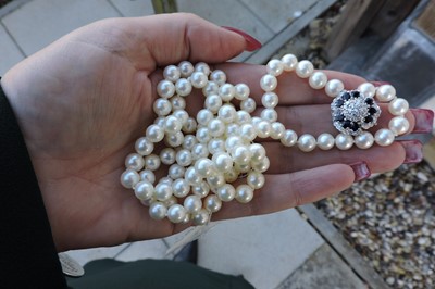 Lot 311 - A two row uniform cultured pearl necklace