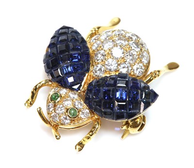 Lot 453 - A gold sapphire, diamond and emerald insect brooch