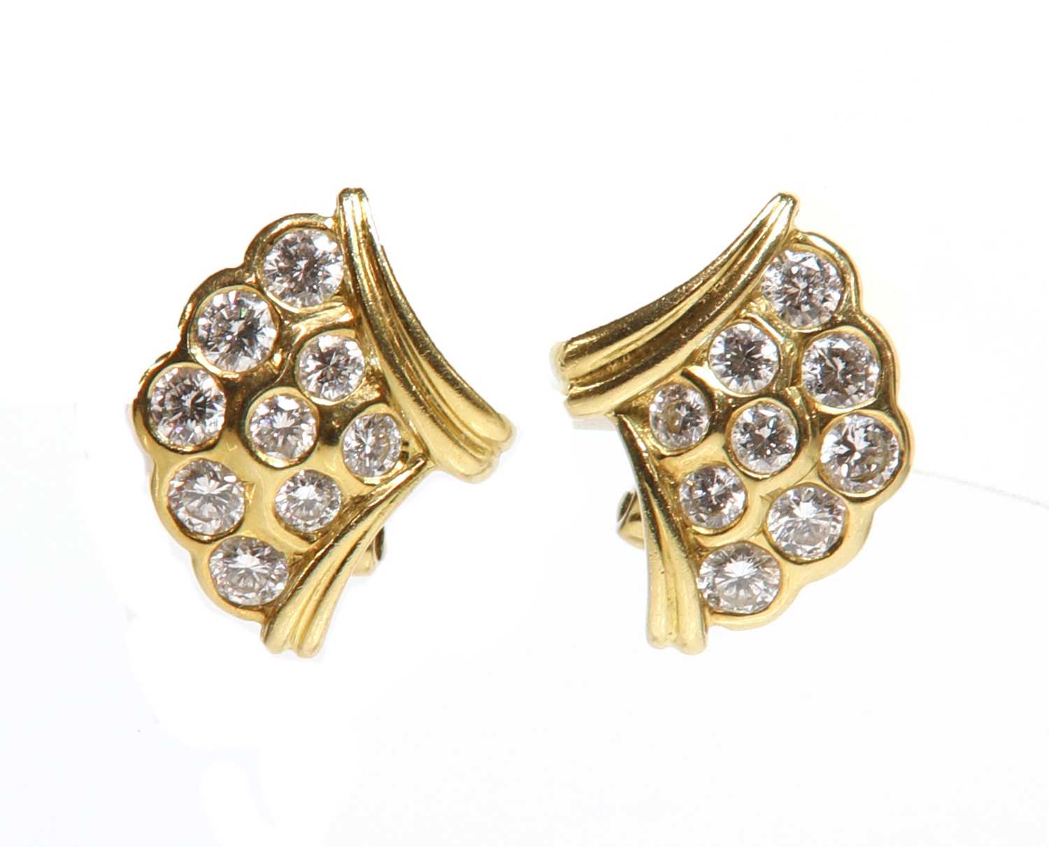 Lot 408 - A pair of 18ct gold diamond set earrings