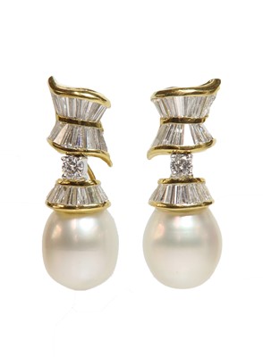 Lot 308 - A pair of cultured South Sea pearl and diamond drop earrings