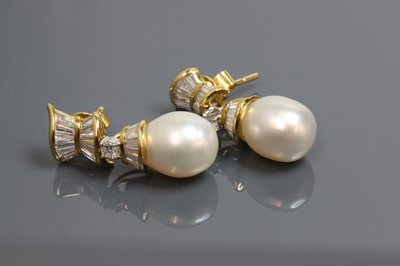 Lot 308 - A pair of cultured South Sea pearl and diamond drop earrings