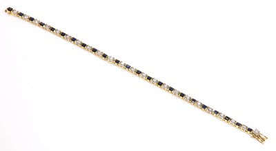 Lot 456 - A gold sapphire and diamond bracelet