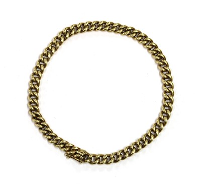 Lot 203 - A gold curb link bracelet
