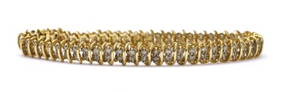Lot 105 - A gold diamond set bracelet